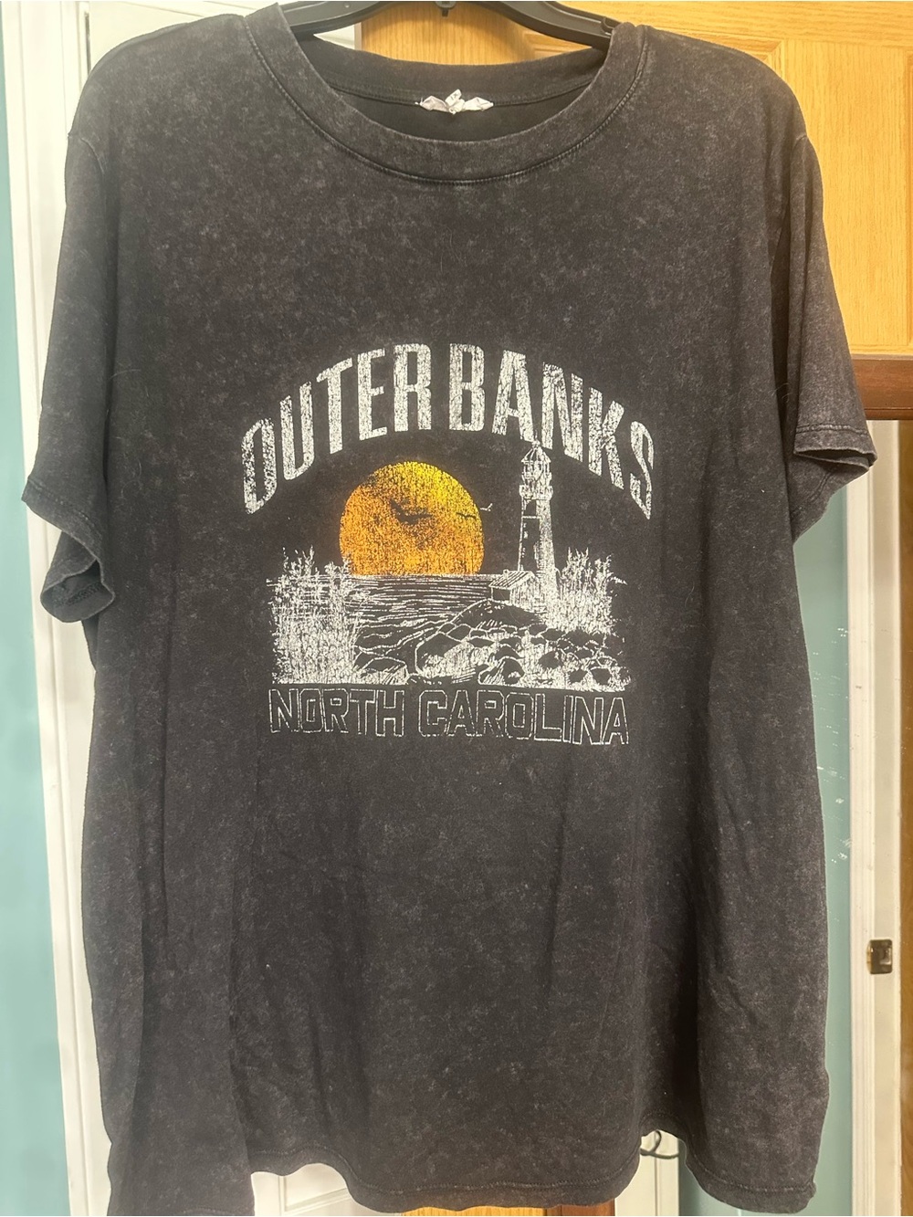 Maurices Black Outer Banks North Carolina Graphic Tee with Orange Sun